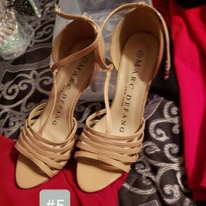 Size 9 marc defang heels only worn a couple times at pageant inside.